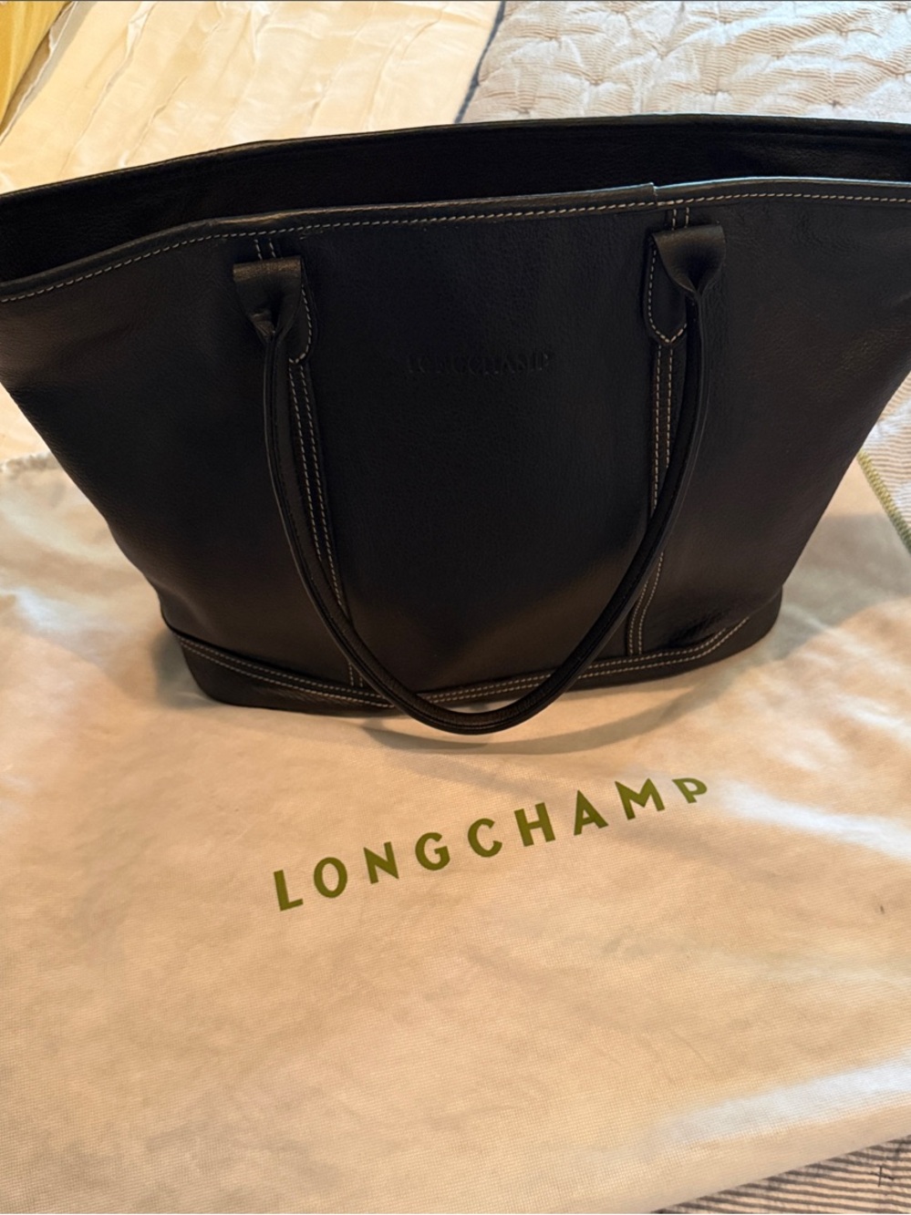 Longchamp Black Tote with White Contrast Stitching and bold red interior